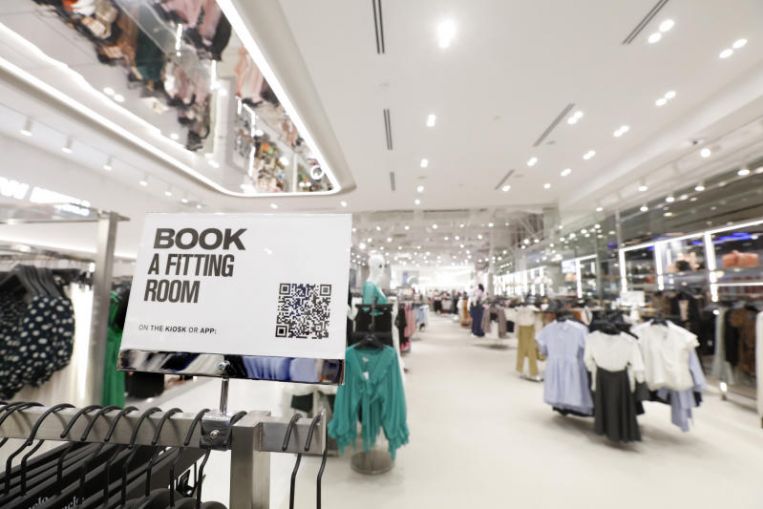 Hate lining up for the fitting room? Stores turn to tech to